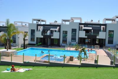 Beneden appartement in Oasis Beach Punta Prima 8 Nº 039 on España Casas